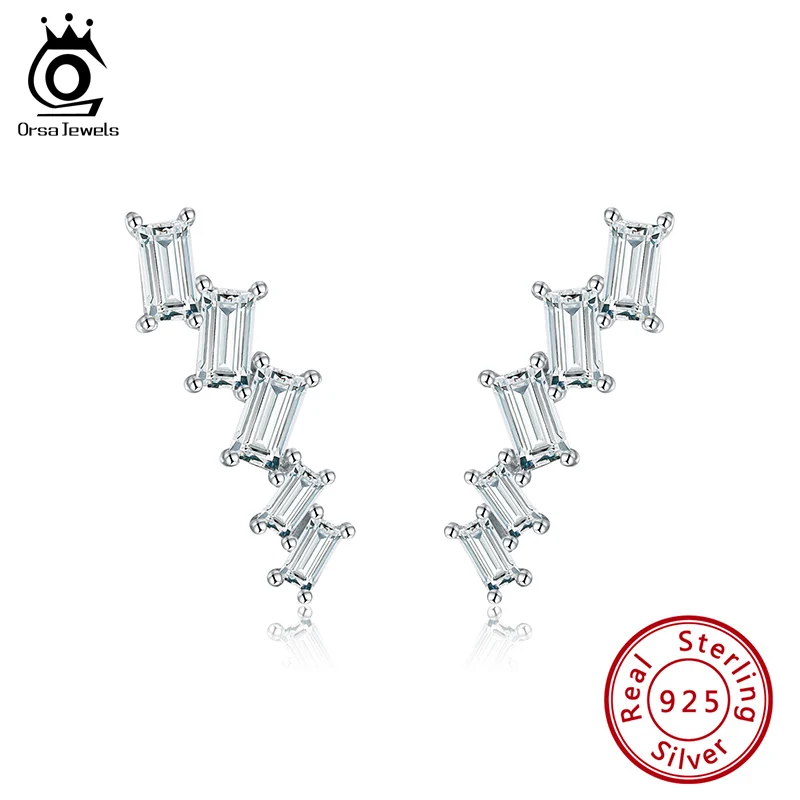 ORSA JEWELS Асимметричные серебряные серьги гвоздики 925 пробы с 5 прозрачными
