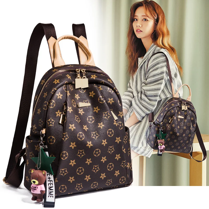 

Double shoulder bag with a new fashion leisure soft leather travel bag backpacks school bags PU China Guangzhou Free shipping
