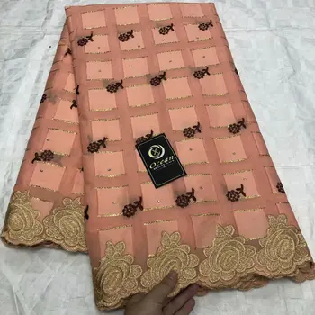 

New Fashion African Bazin Lace Fabric Embroidery Nigerian Bazin Riche Lace Fabric With Hole And Stones For Sewing