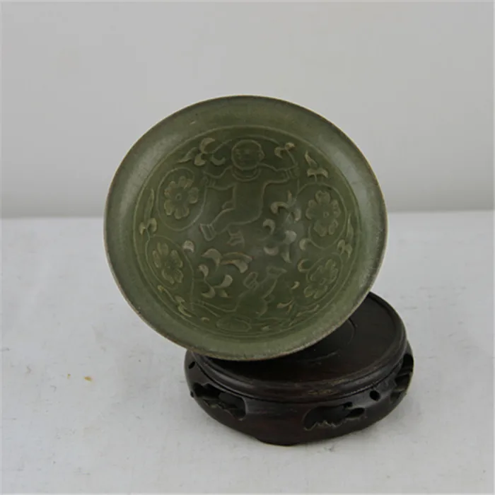 

Зеленая глазурованная бамбуковая шляпная чаша с узором в виде куклы династии песнь яочжоу