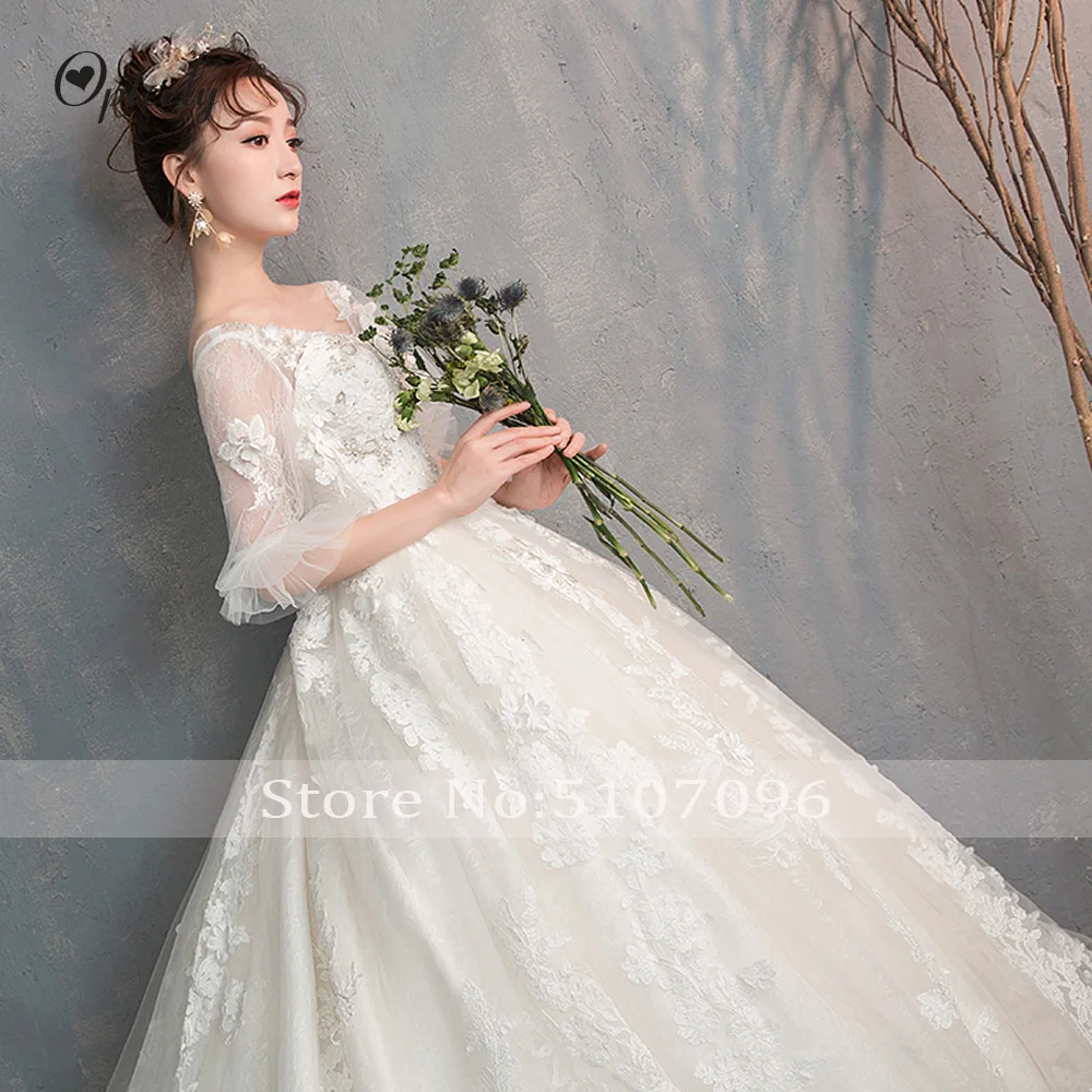 Optcely Robe De Soiree роскошное бальное платье с рукавами фонариками сексуальное с глубоким v-образным вырезом с аппликацией из бисера с открытой спиной Свадебные платья