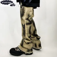 Główna ulica męskie długie nadrukowane Graffiti dżinsy Vintage Hip Hop frędzle Flare luźne spodnie kowbojskie Harajuku człowiek spodnie dżinsowe tanie i dobre opinie DE (pochodzenie) Zipper fly Tassel Drukuj Spodnie pochodni light Midweight Pełnej długości Zmiękczania JEANS