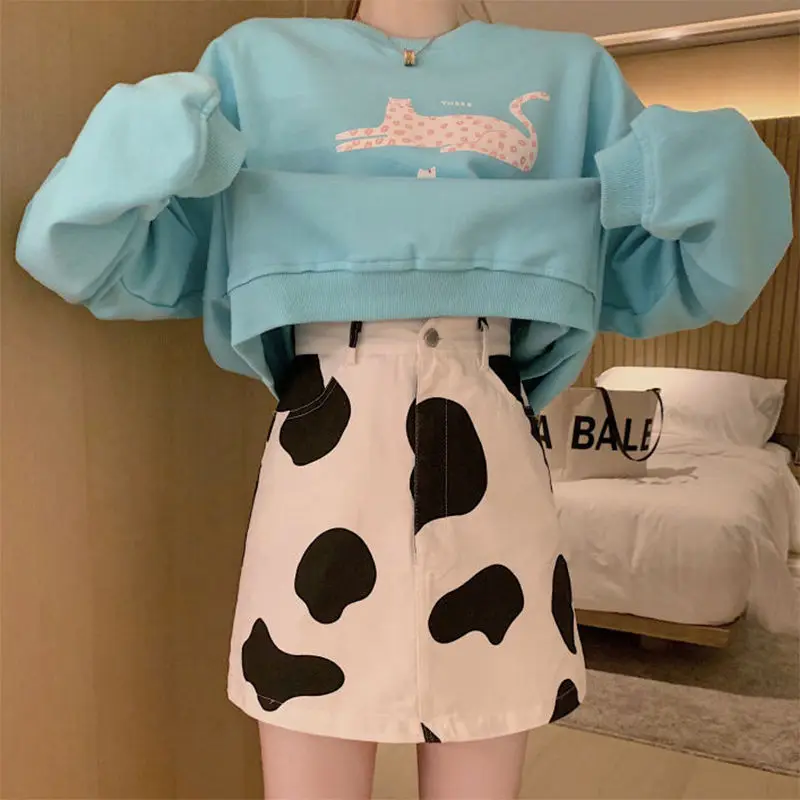 

Korean wild lazy wind cartoon high waist print autumn casual A-shaped cow black and white dot print skirt