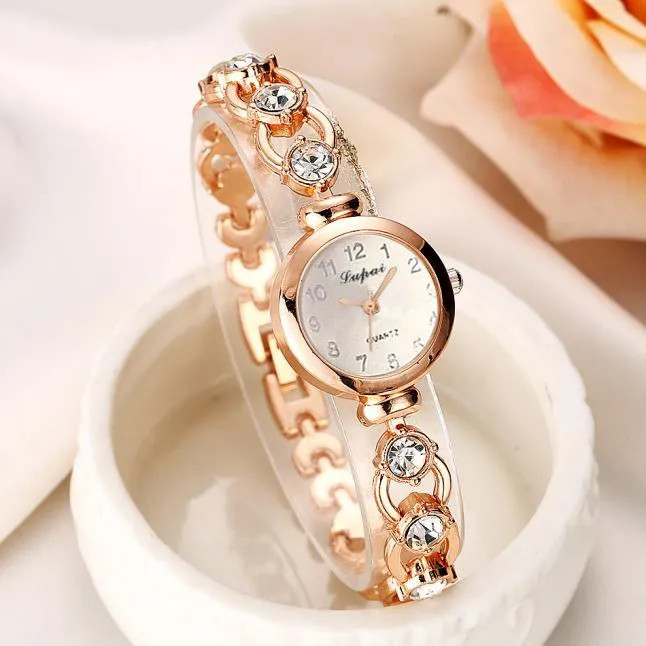 цена Ladies Elegant Wrist Watches Women Bracelet Rhinestones Analog Quartz Watch Women's Crystal Small Dial Watch Reloj #35