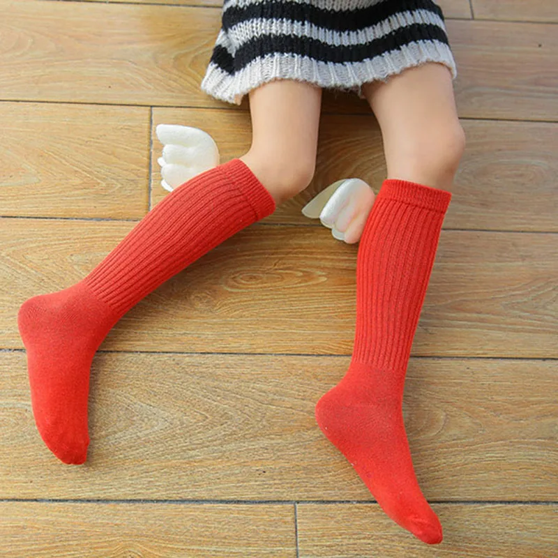 2-10Y niños niñas Ángel ala calcetines de Color caramelo bebé suave lindo Knee calcetín de los niños Raya Vertical suave de la manguera calcetines T0833
