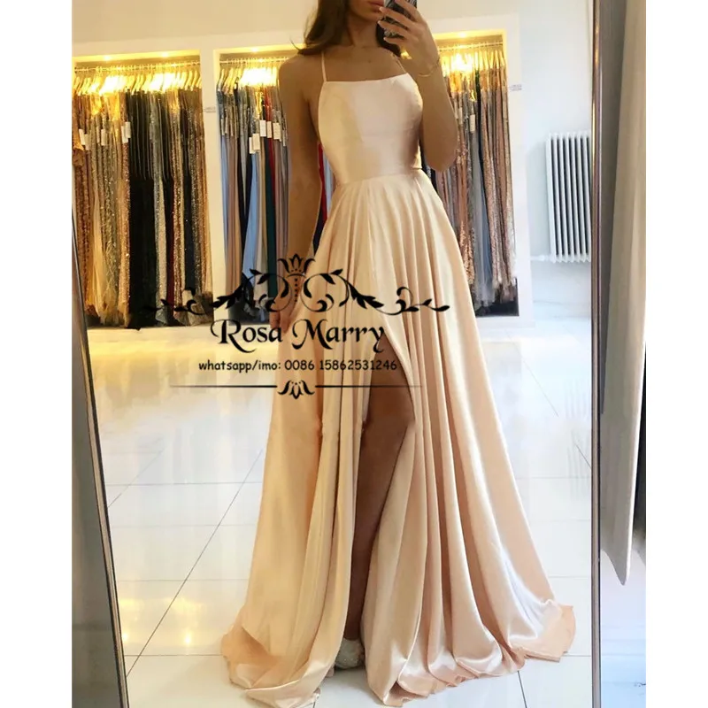 

Sexy Champagne Backless Prom Dresses 2K20 A Line Halter Plus Size Cheap Long High Split Girls 2020 Formal Celebrity Evening Gown
