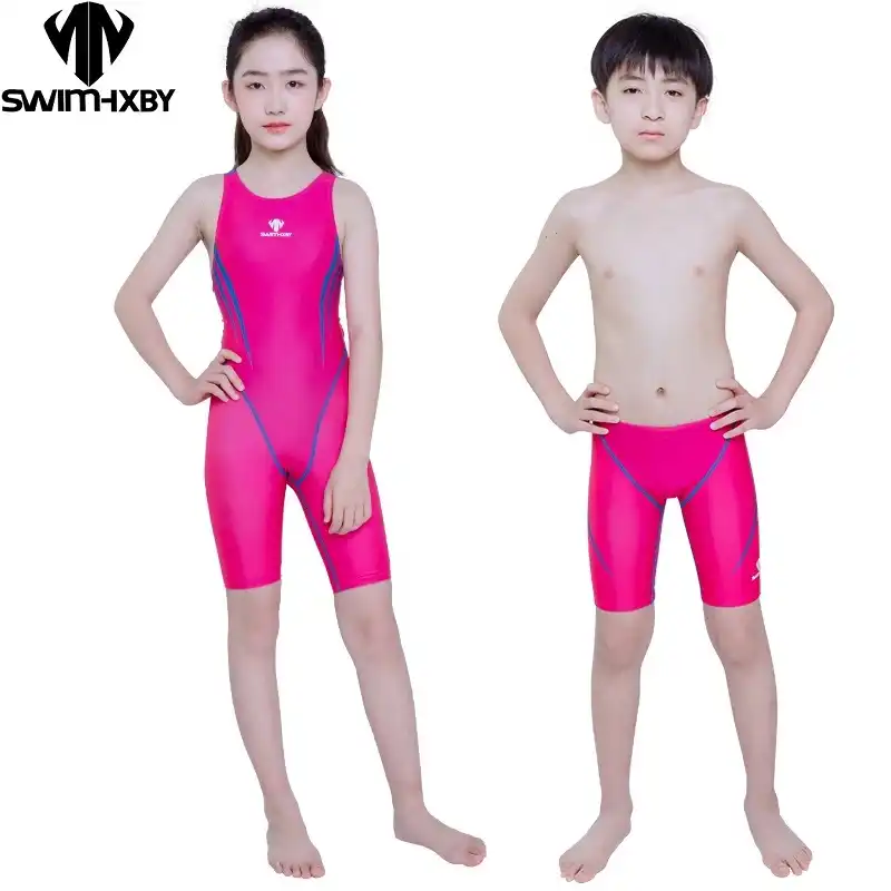 boy wearing one piece swimsuit