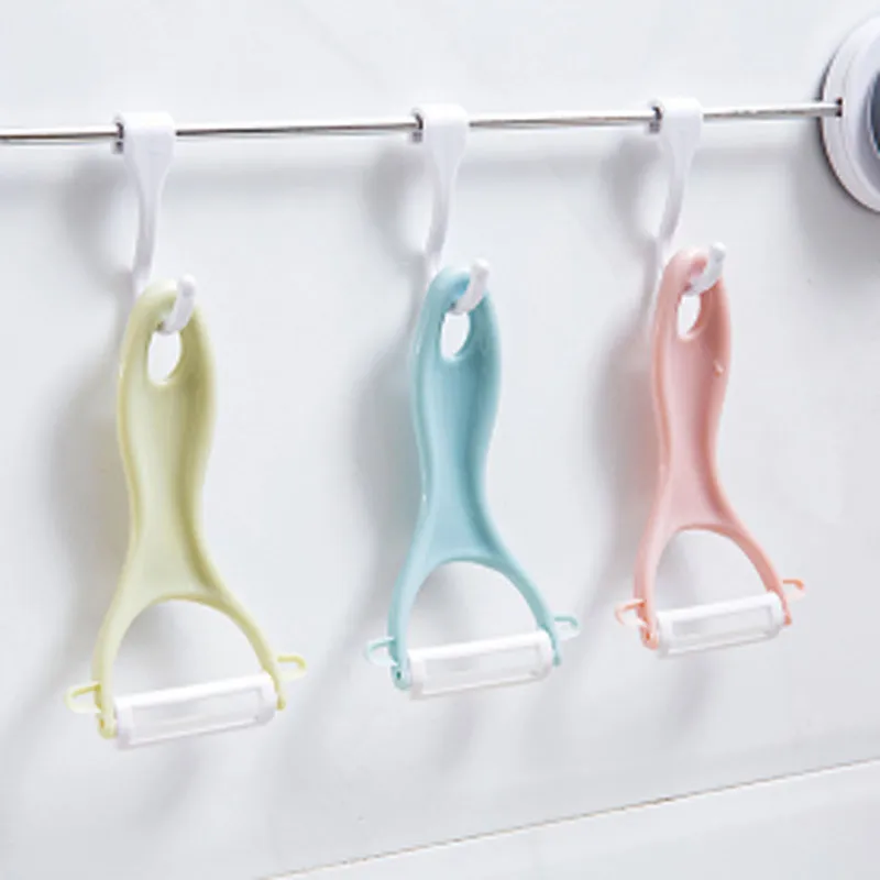 

2020 Multifunctional Ceramic Fruit Peeler Kitchen Peeling Knife Creative Peeling Knife With Hanging Holes For Home Kitchen Tools