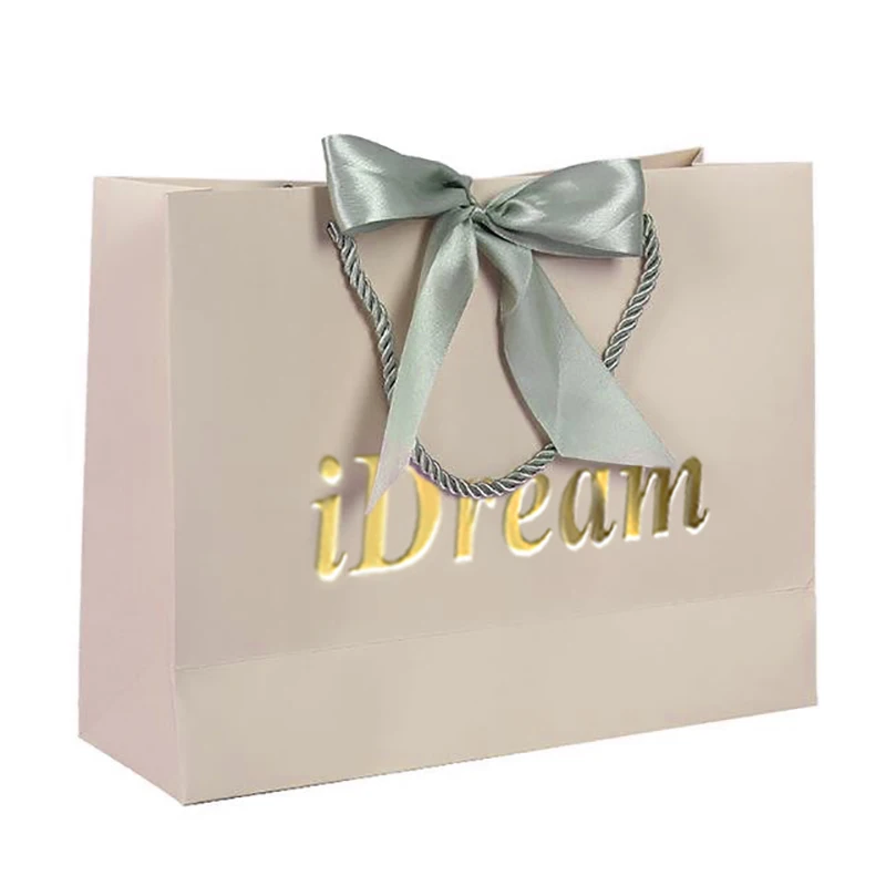 white gift bolsas with ribbon handles