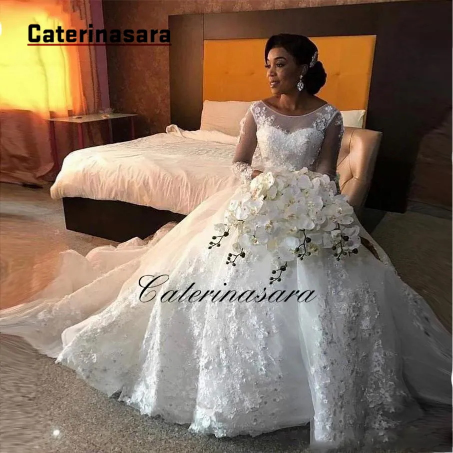 

Luxury Ball Gown African Wedding Dresses Long Sleeve Scoop Lace Appliques Beaded Arabic Bridal Gowns New Fashion