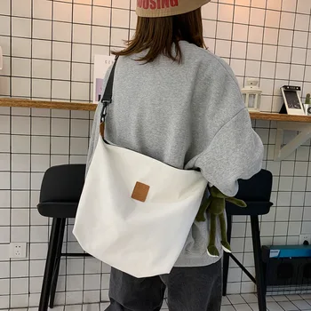 

Hong Kong style literary bag female 2020 new simple girl canvas shoulder bag Korean fashion college style crossbody bag