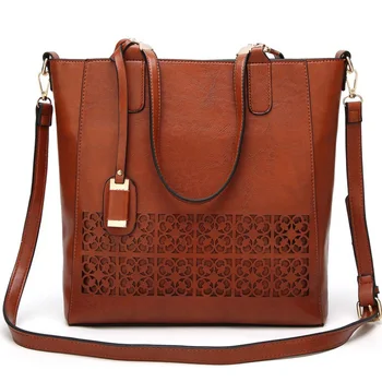 

Europe and America fashion Cutout Female bag 2020 summer New Handbags Shoulder Messenger Bag Women's designer PU Bucket Bags sac