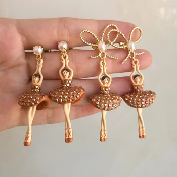 

2020 Hot Sale Direct Selling Tin Alloy Pendientes Earing Ballet Ear Earrings With Rust Bowknot Wind Restoring Ancient Ways