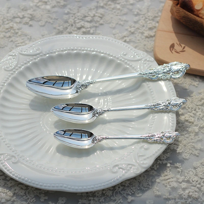 silver dinnerware set  (2)