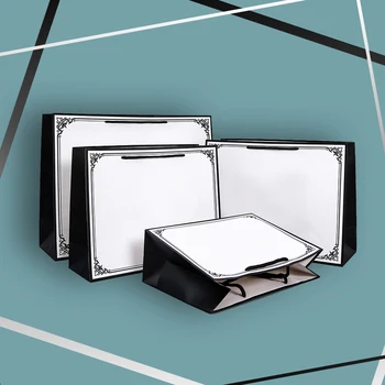 

40pcs Wholesale Premium Custom Made logo printing white shopping paper bag with black cotton handle