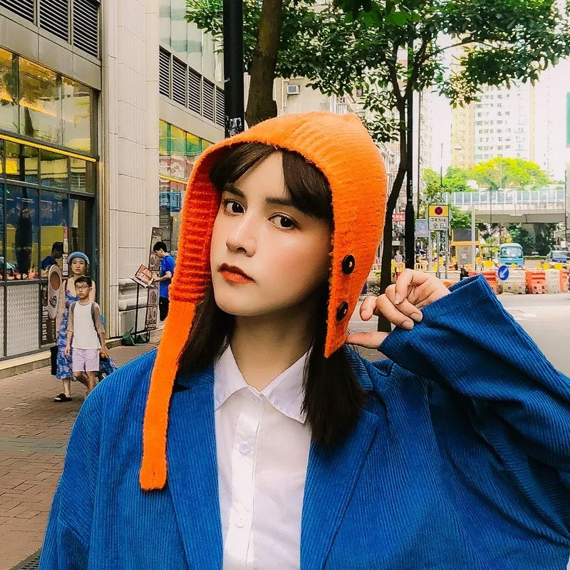 

Japan and South Korea trend button ear protection knitted hat female cute sweet pullover hat wild warm knitted wool hat