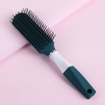 

Massage comb, color green / white