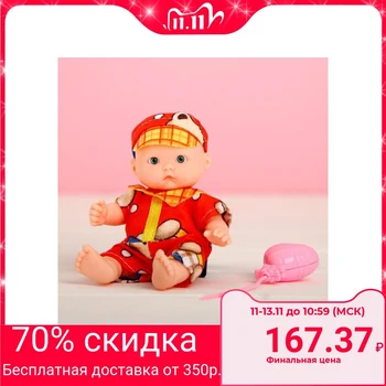

Baby doll "Kid" in a suit, with an accessory