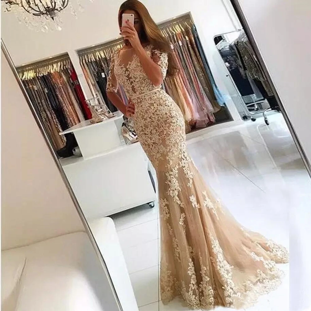 

Champagne Lace Mermaid Prom Dresses Sheer Half Sleeves Backless Illusion Jewel Neck Formal Evening Dresses Wear Party Gowns