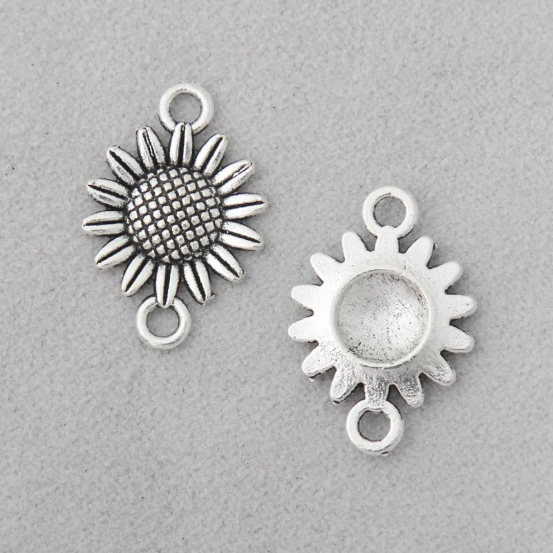 

RAINXTAR Fashion Alloy Sunflower Connector Charms For Bracelets Making 15*22mm 100pcs AAC501