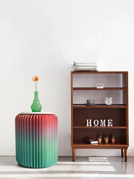 

Creative design of 18 paper stool fashion round low shoes makeup stool art folding personality Nordic wind ins flow color