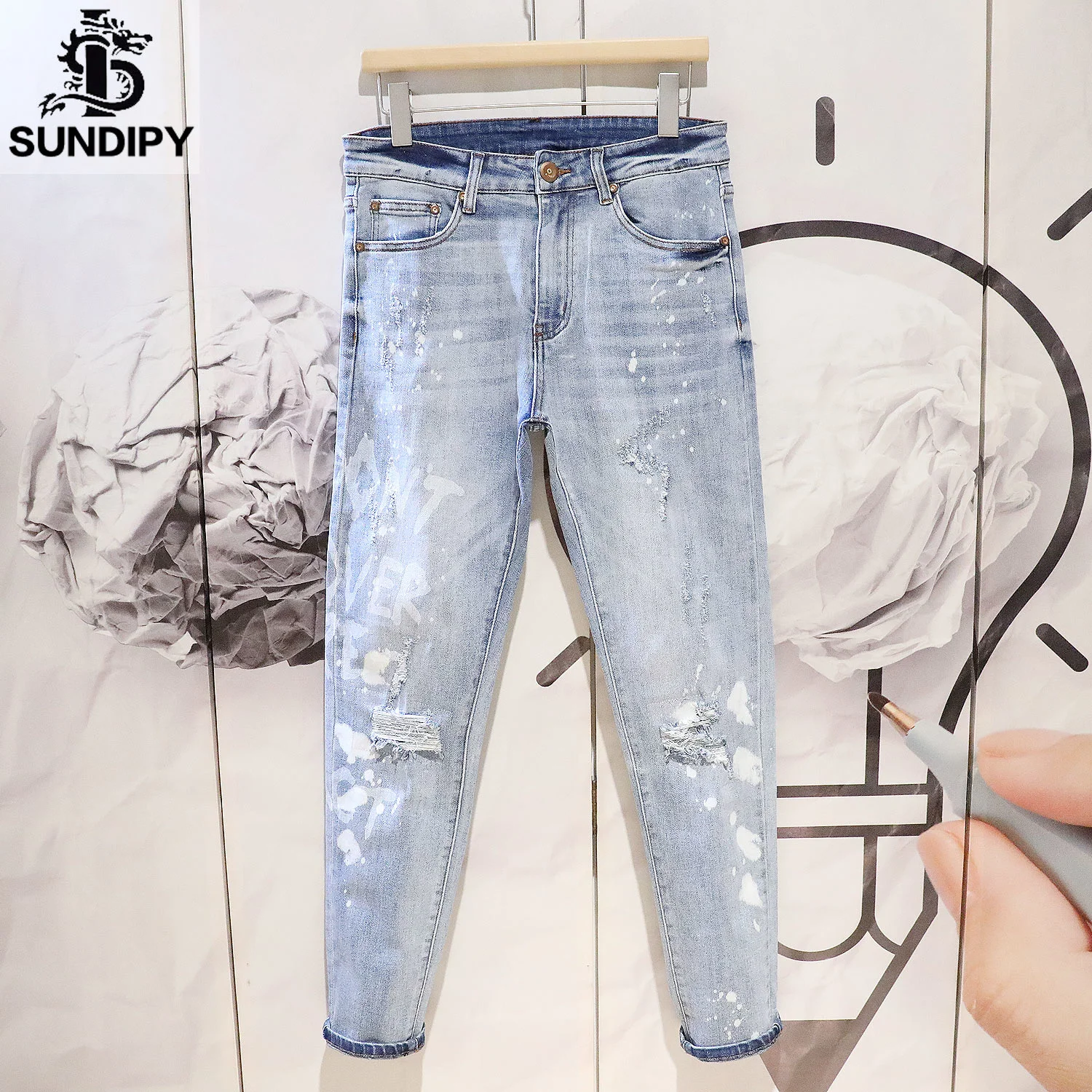 New Men's male badge patches buttons fly slim jeans Trendy light blue holes  ripped distressed denim straight pants trousers - AliExpress