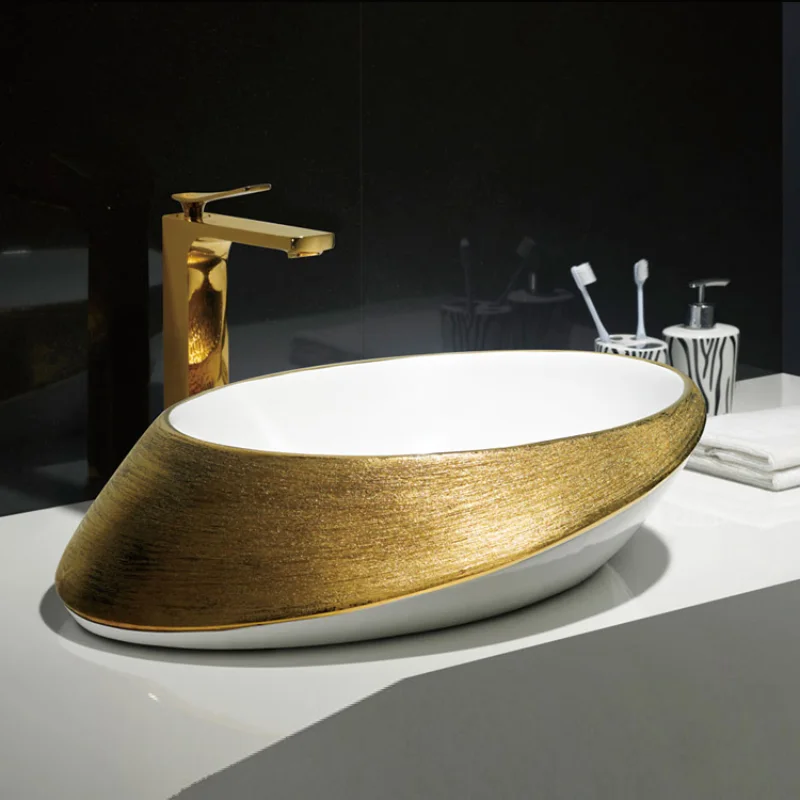 

Lavabo de cerámica ovalado para encimera de hotel, lavabo de mano de color dorado chapado de lujo para Baño