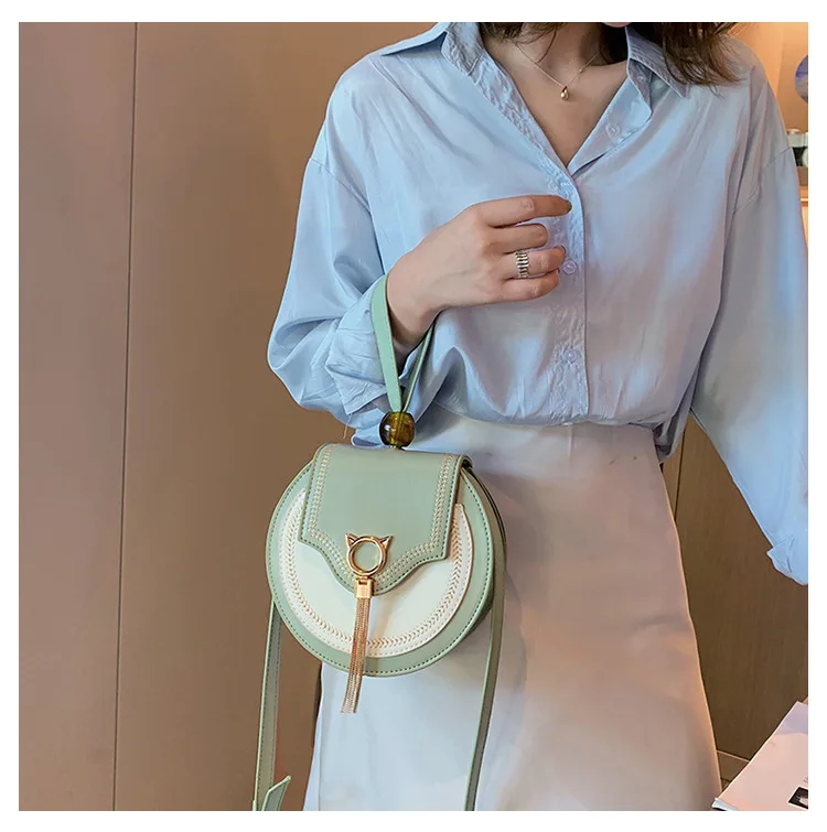 

2019 New Buddhist beads small round bag sewing thread simple handheld single shoulder slanted women's bag straight shoulder