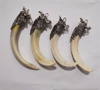 

Tibetan Silver dragon head with boar Tooth Pendant, exquisite crafts, decorations, collectibles Pendant