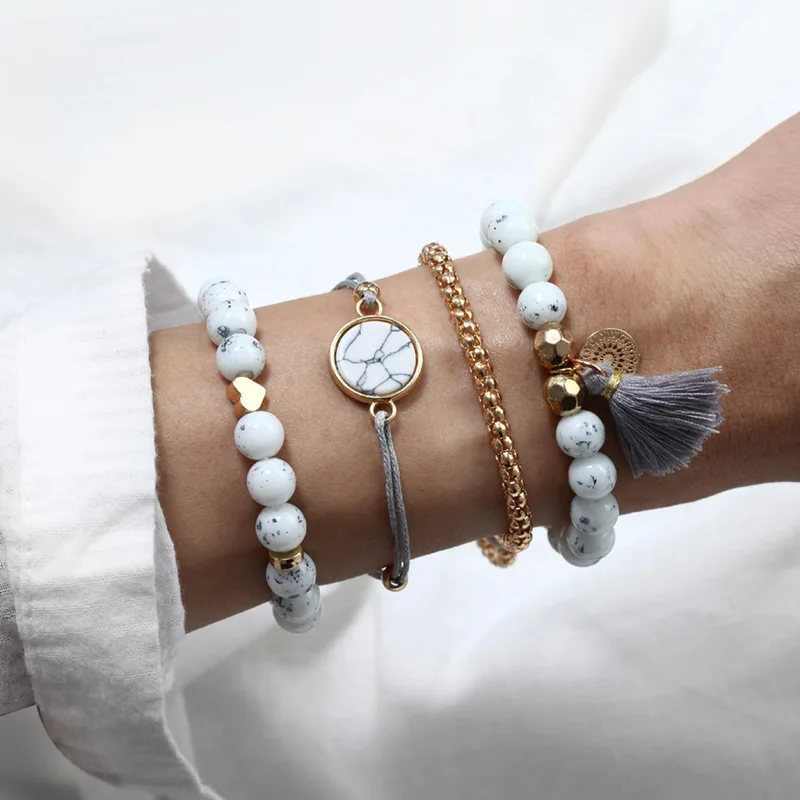 Simple and creative geometric hollow metal round piece turquoise love tassel pendant bracelet four-piece set | Украшения и