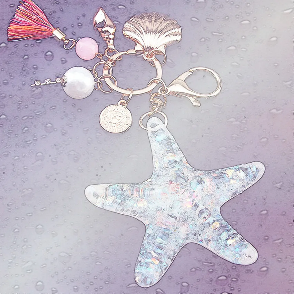 

New design selling European and American new sea star key chain creative tassel car pendant alloy lady bag Pendant keychain