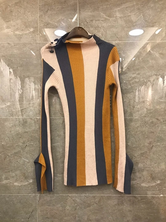 

2019 early autumn new female round neck shoulder buckle color matching striped woven long-sleeved wild sweater 825