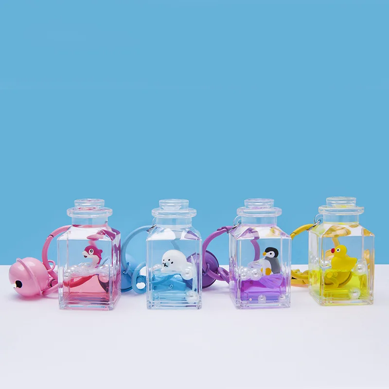 

Cute Marine Animals Clownfish Dolphin Penguin Sea Lion Keychain Starry Liquid Crystal Quicksand Keyrings for Women Bag Jewelry