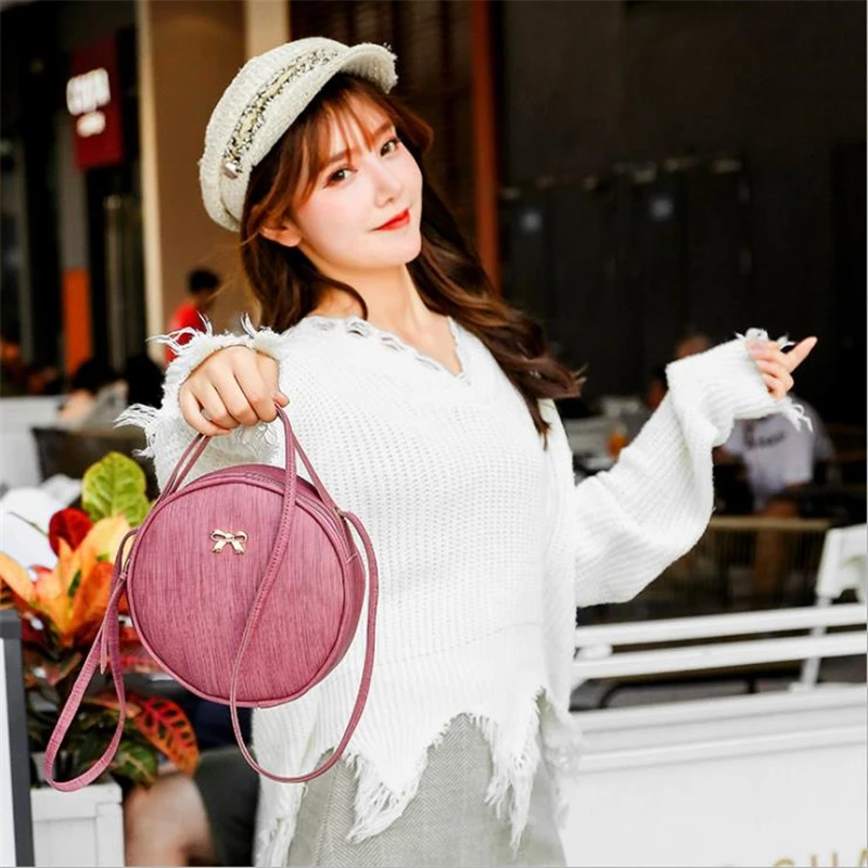 

Ladies Korean version of the toothpick pattern small round bag 2019 Korean version of the new bow tie shoulder Messenger bag