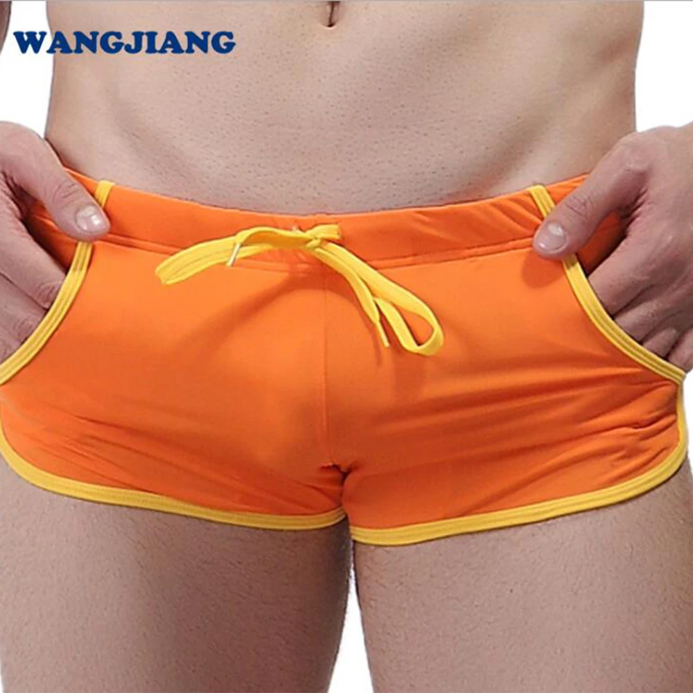 

20201 Summer Swimming Beach Surfing Sports Casual Shorts Men's Swimming Trunks Mens Low Waist Sexy Pocket Boxer Swimwear