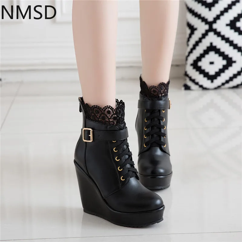 ladies black wedge boots