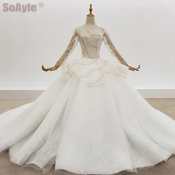 شراءفساتين زفاف SoAyle Ball فساتين زفاف 2020 برقبة مستديرة كريستال لامعة ترتر بدون ظهر وسط مكشكش فستان زفاف بأكمام