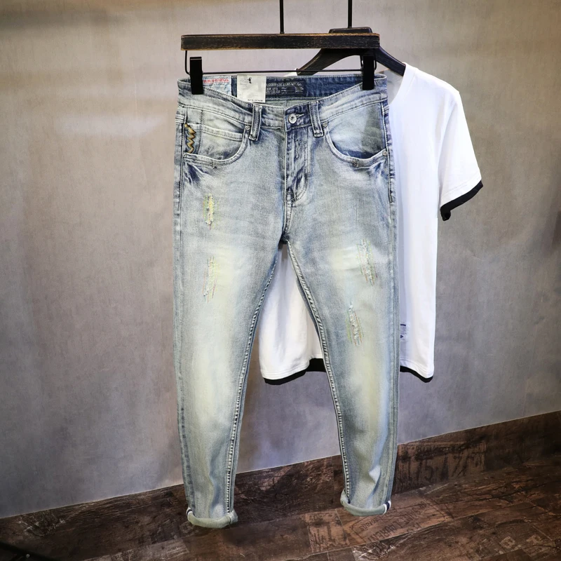 

Newly Designer Fashion Men Jeans High Quality Retro Light Blue Ripped Denim Pencil Pants Korean Style Elastic Slim Fit Trousers