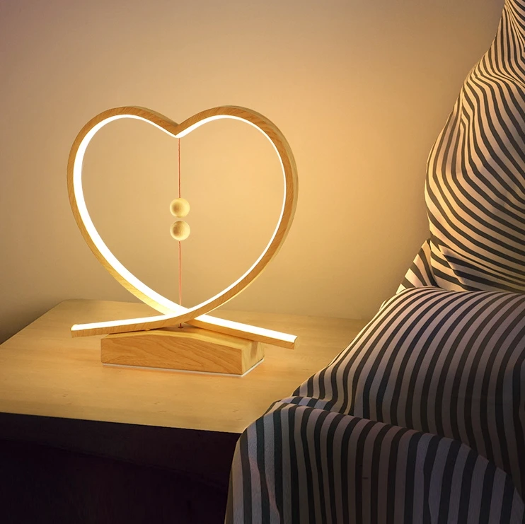 

Bedroom sitting room desk lamp warm bedside lamp Nordic girl creative balance lamp suspended shaking love decorative lamp