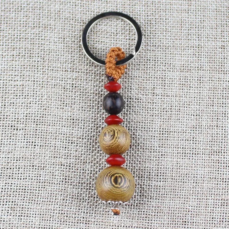

Manufacturers Wholesale Door Frame Keychain Automobile Hanging Ornament Flower Bodhi Root Hodo Pipal Tree Seed Key Chain Men And