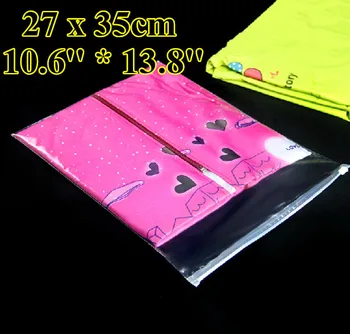 

Free Shipping 100pcs/lot 27cm*35cm*120mic Transparent Plastic Bag,Christmas Clothing Bags,Plastic Zipper Storage Bags