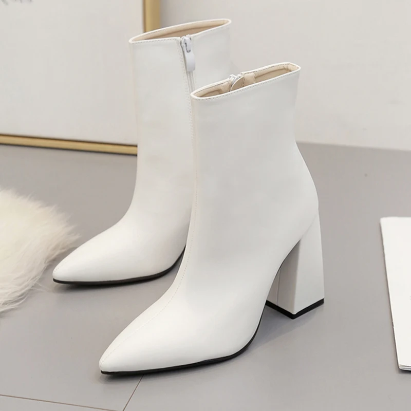 

Solid color high heel boots winter short paragraph short boots pointed side zipper wild warm boots ladies code women boots