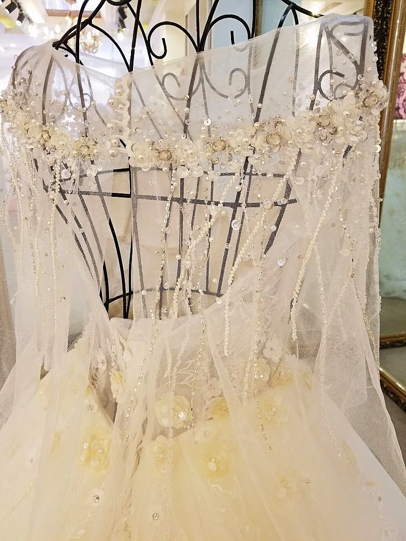 Цветы хрусталь бисер Тюль Свадебные платья Половина рукава Vestido De Noiva Princesa Luxo свадебное платье pakaian pengantin