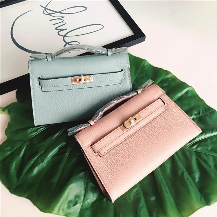 

Genuine Leather Female Popular kay Hand Take Baotou Layer Cowhide Single Shoulder Diagonal Function Bag