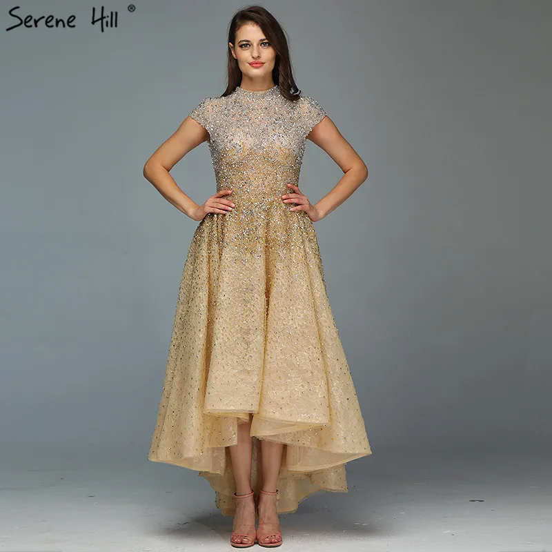 Золотые вечерние платья с высоким воротом роскошные асимметричные 2020 расшитые