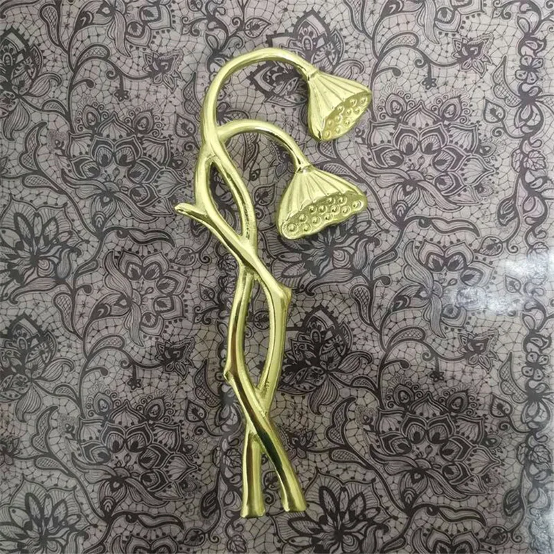 poignee en forme de racine en laiton pour porte meuble faire 02