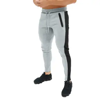 

Sporty Men Autumn Color Block Drawstring Pockets Skinny Joggings Pencil Pants Men's striped lace-up running pants