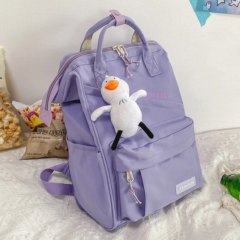 

2022 Preppy Purple Backpack Women Waterproof Candy Colors Backpacks Fancy High School Bags for Teenage Girl Cute Travel Rucksack