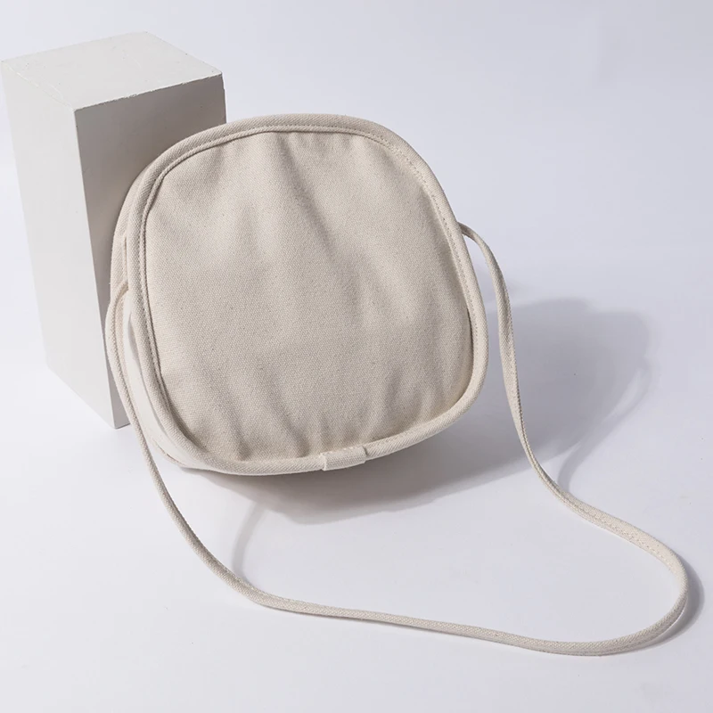

2019 small round the new canvas bag contracted one shoulder bag joker white canvas bag female personality
