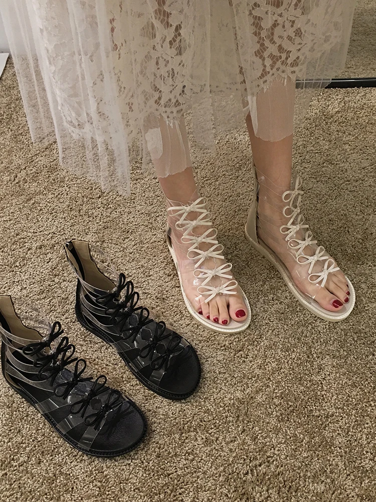 Женская обувь; сандалии; Новинка 2019 года; летние модные римские сапоги на плоской подошве с прозрачным бантом